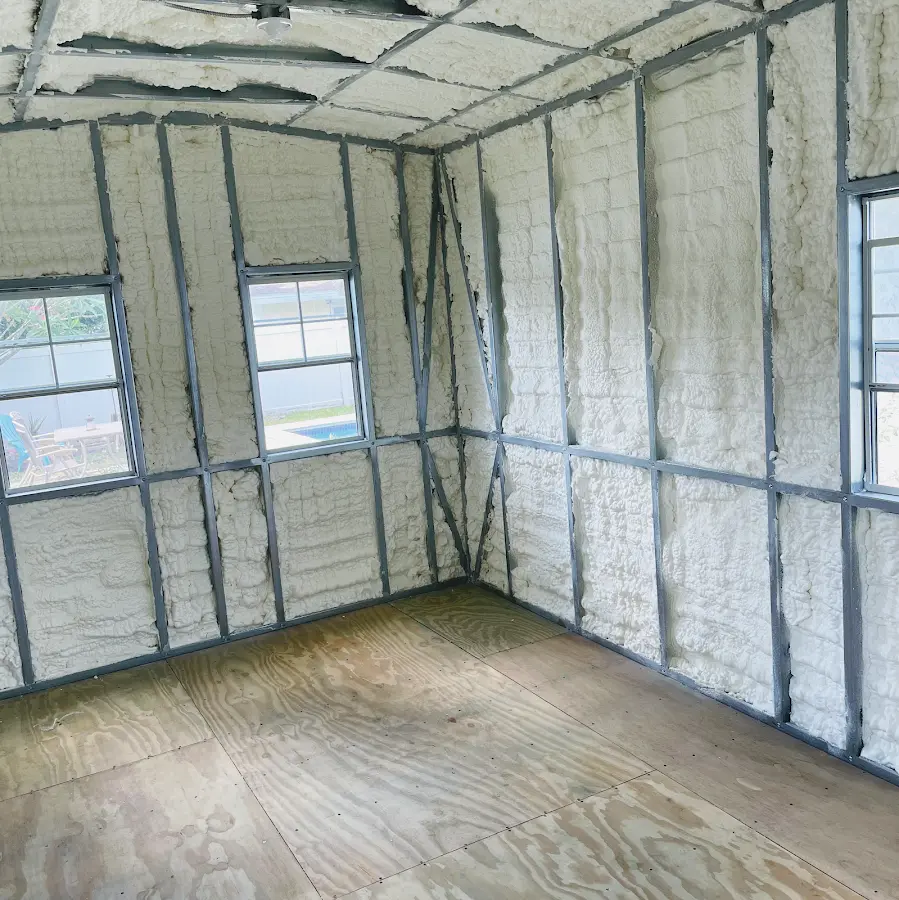 Closed-cell spray foam insulation applied to wall cavities in a residential project in Parma Heights